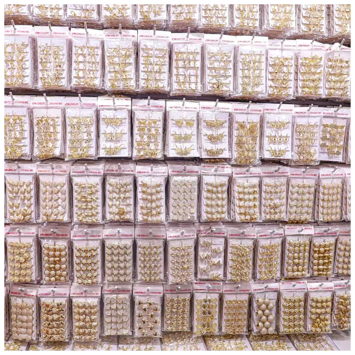 A wall of individually packed jewelry stock